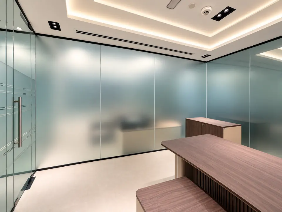 Office meeting room glass walls with full frosted privacy film