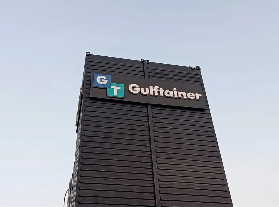 Gulftainer exterior sign on a timber-clad building