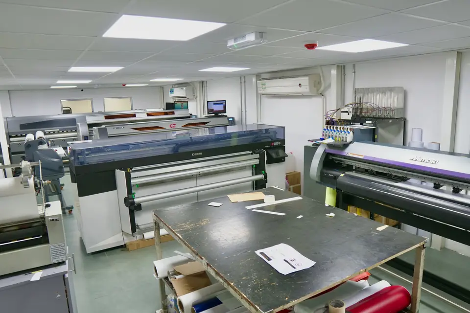Victory print room with Canon and Mimaki large-format printers