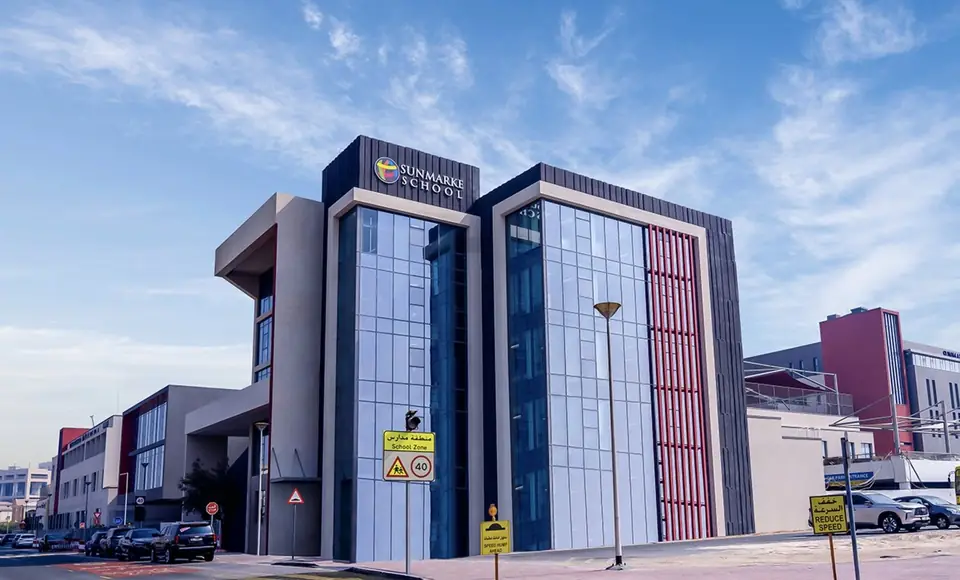 Sunmarke School building with rooftop logo signage, Dubai