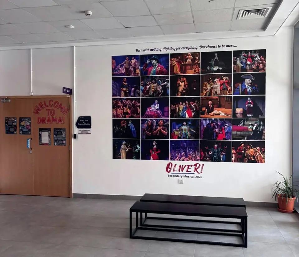 Photo collage wall graphics inside a school hall